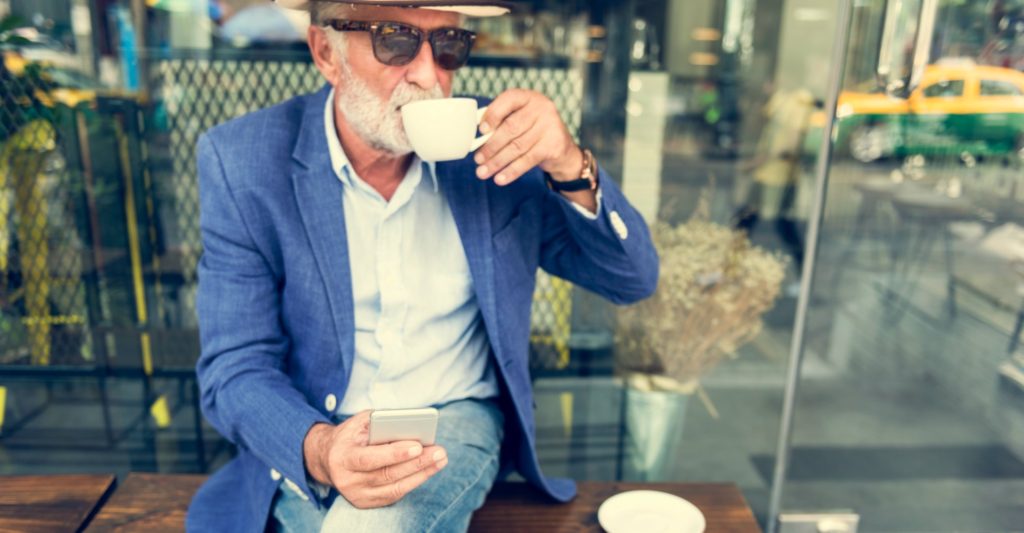 Senior Man Coffee Shop Communication Connection Technology Concept