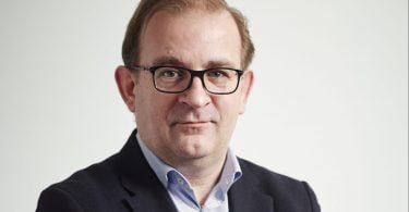 Aprroved headshot Mark Barnett April  scaled e